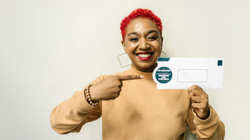 A Woman Holding an Envelope