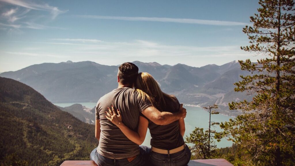 Man and Woman Sitting on Bench
