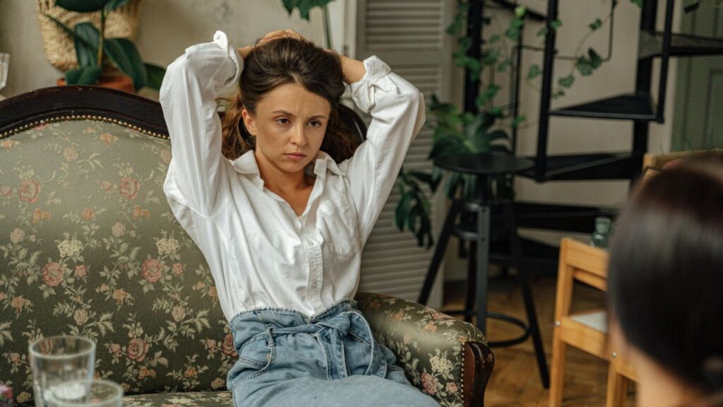 Girl in White Dress Shirt and Blue Denim Jeans