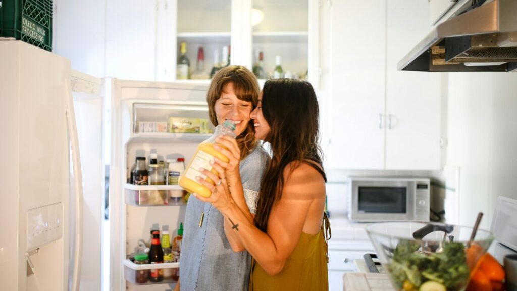 Standing in front of a Refrigerator