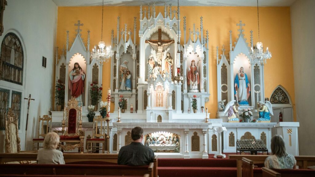 People Sitting on Brown Wooden Bench
