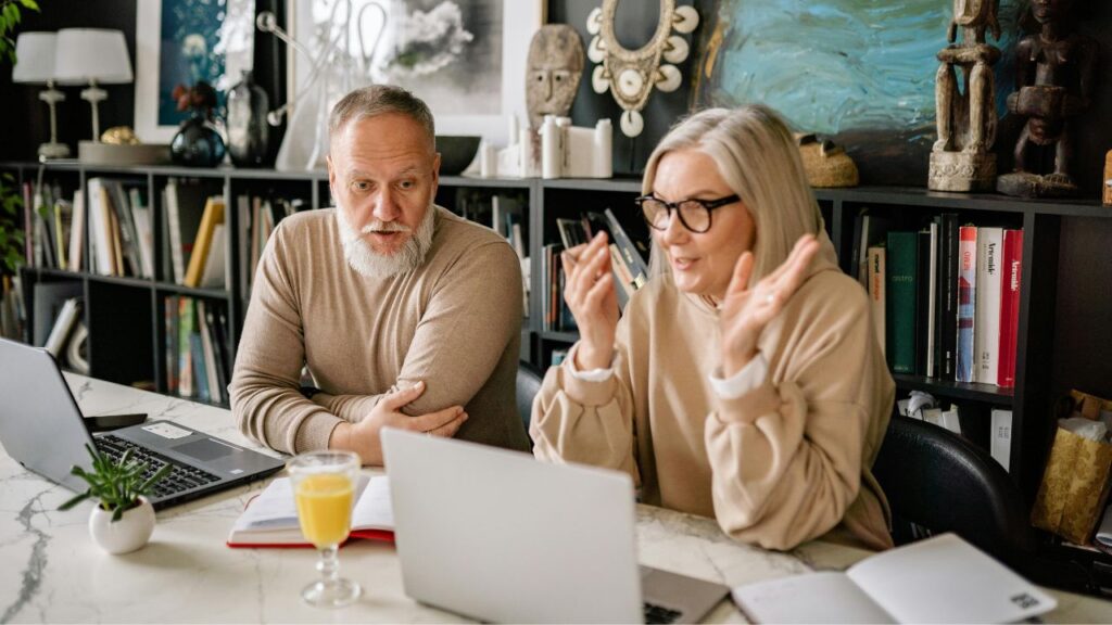 Man and Woman Sitting at Table
