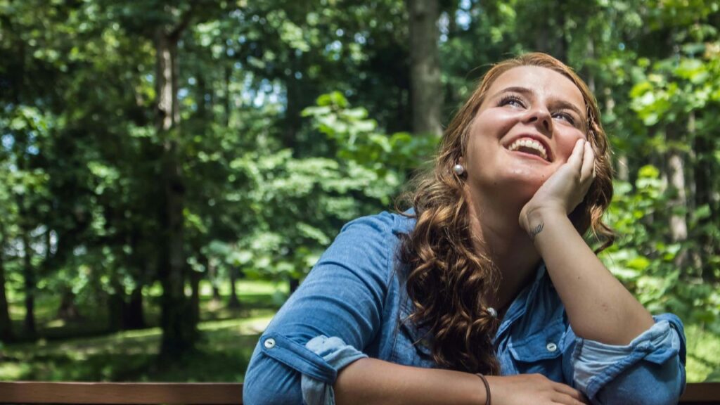 Woman Looking Up Smiling