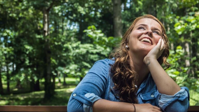 Woman Looking Up Smiling