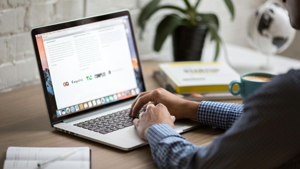 Person Using Macbook Pro