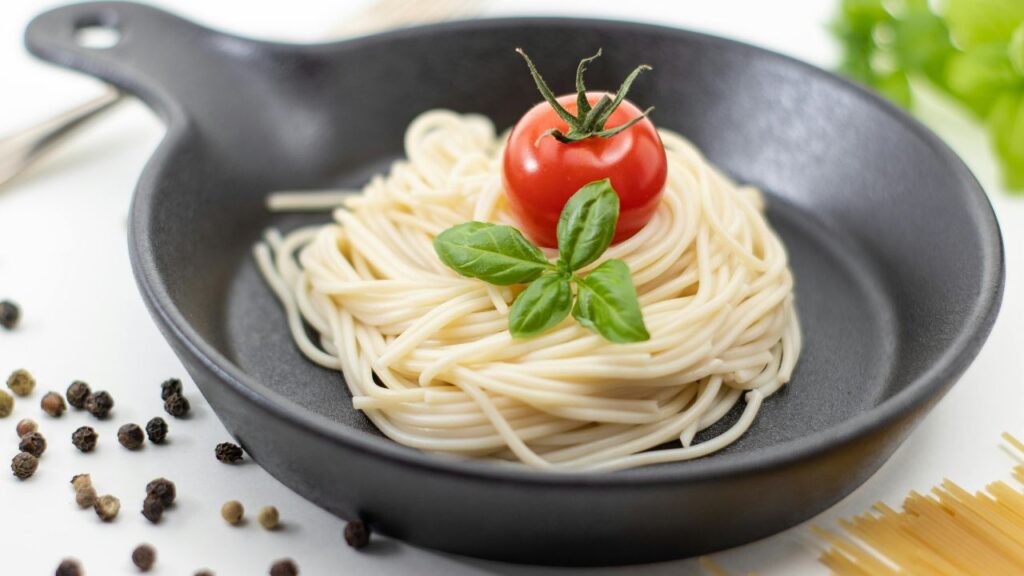 Fresh Spaghetti in Pan with Tomato and Basil