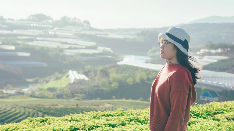Side View Photo of a Woman in the Field