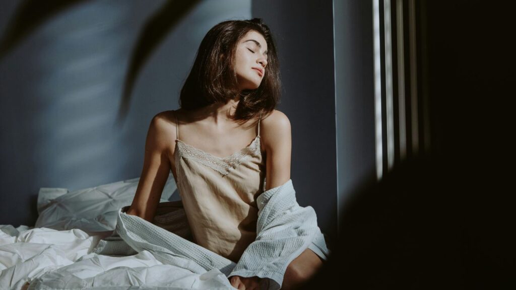 A woman in the bedroom