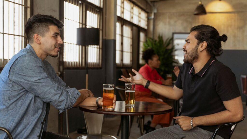 Men Having Conversation while Looking at Each Other