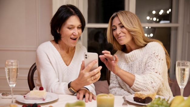 Middle age friends at night having dinner