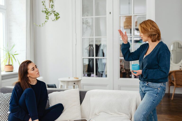 Two women engage in a friendly chat