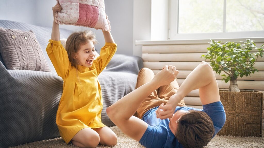 Father and daughter playing