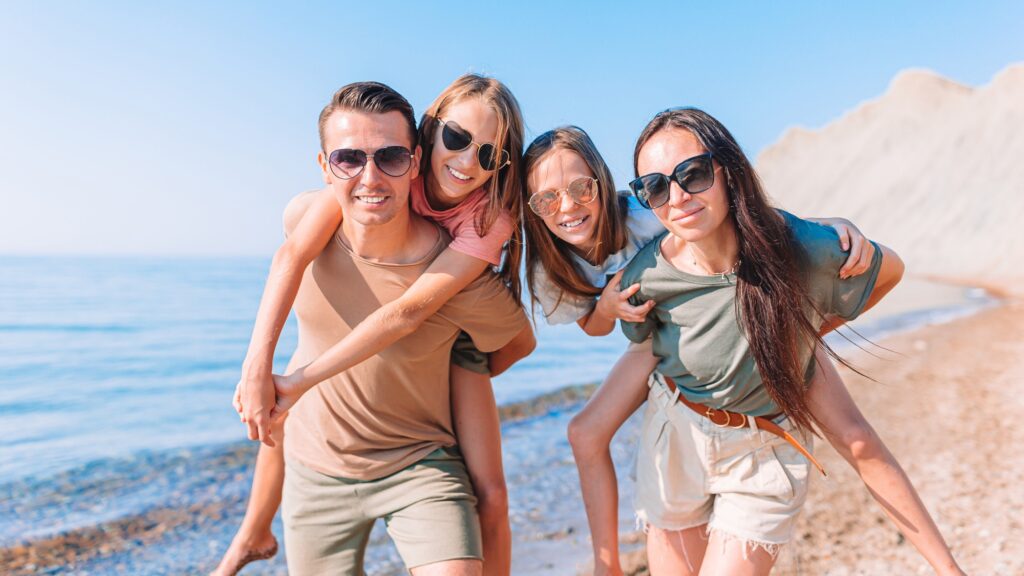 Happy family on a beach during summer vacation