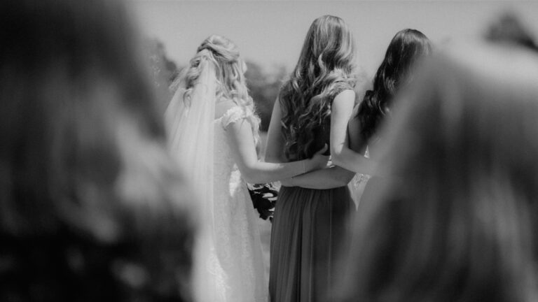 a group of women standing next to each other