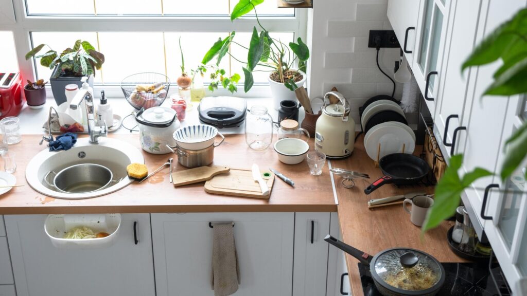 A mess in the kitchen dirty dishes on the table scattered things unsanitary conditions kitchen is untidy everyday life