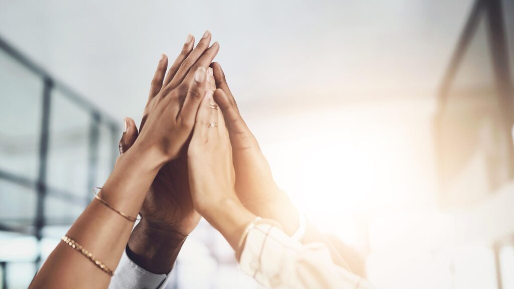 Hands high five and business people with agreement success and celebration with teamwork Collaboration company and group with professional achievement and solidarity at creative job with mockup
