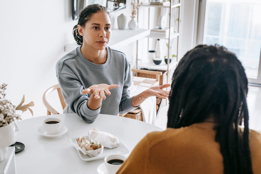 couple at table having serious discussion