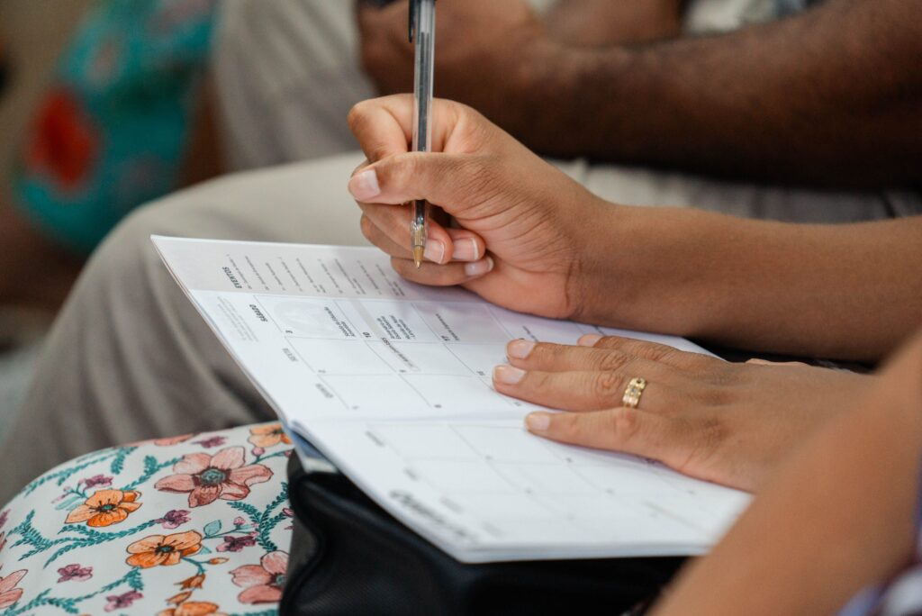 couple looking at calendar schedule