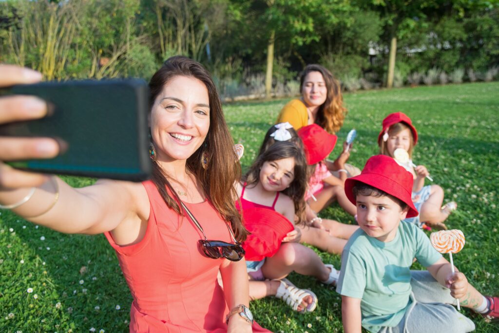 parent taking pictures of kids
