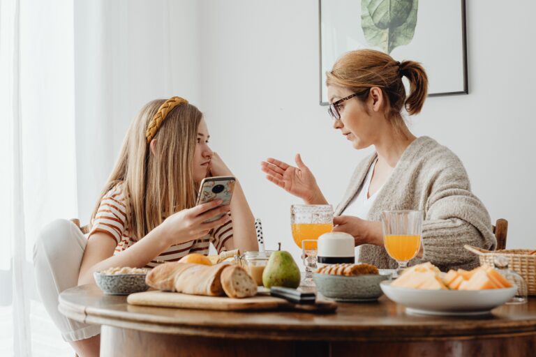 mom talking with teenager