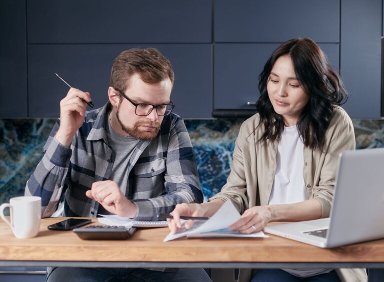 man and woman planning daily tasks together