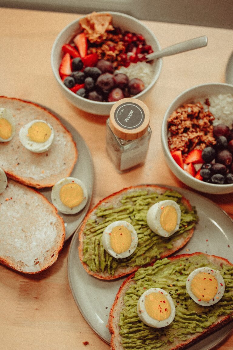 healthy breakfast of yogurt, fruit, eggs