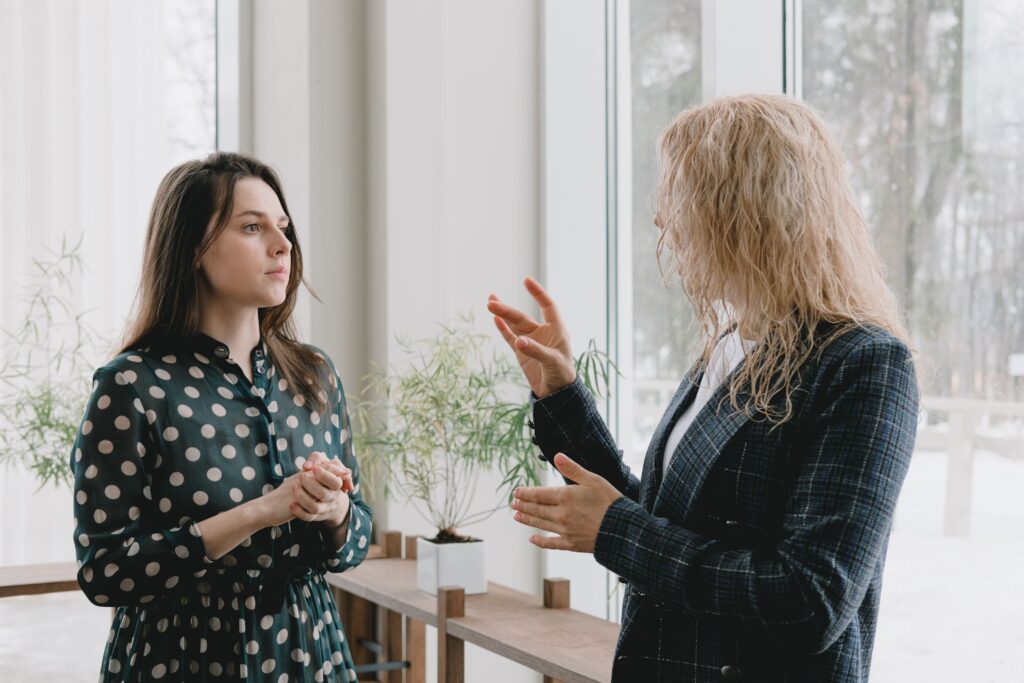 two women in conversation