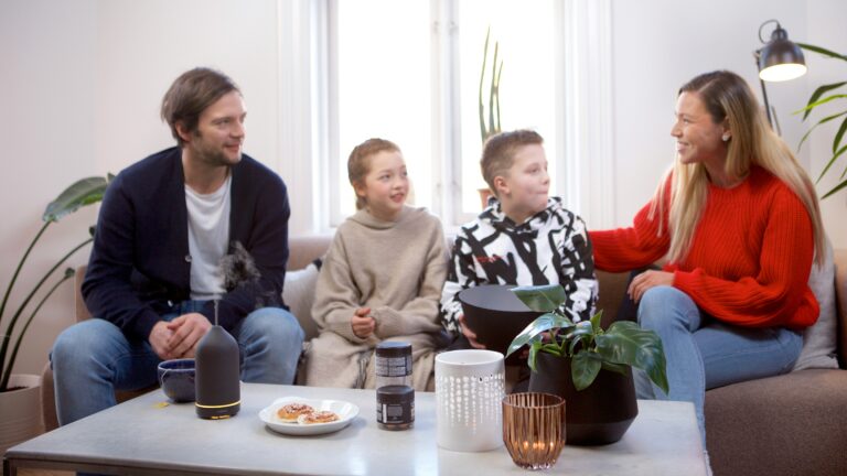 a group of people sitting around a table