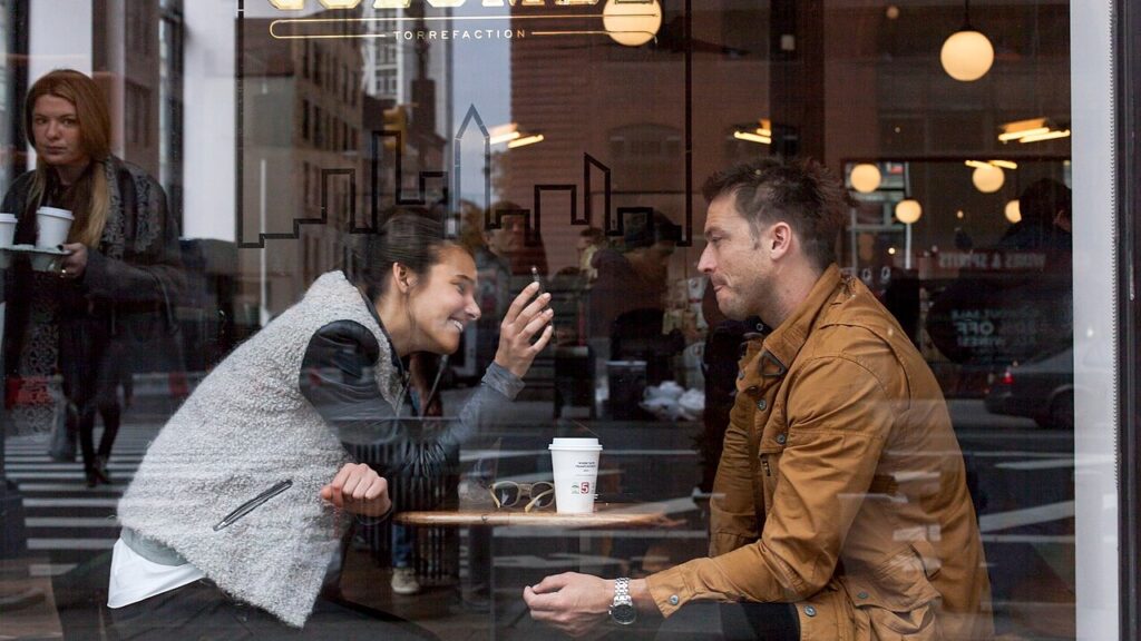 I stopped this moment in time.Couple seated at La Colombe Coffee Roasters Noho, 400 Layfayette Street, Manhattan