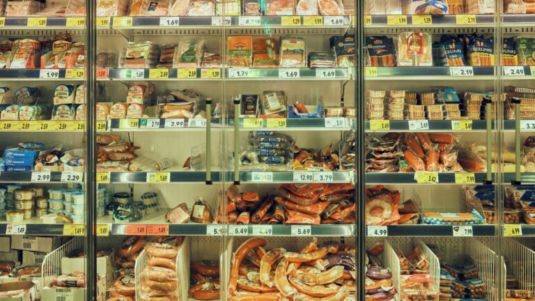 a display case filled with lots of different types of food