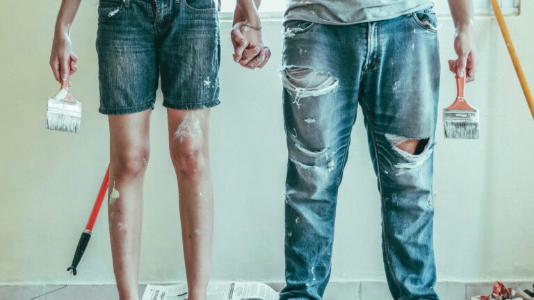 2 person wearing blue denim jeans