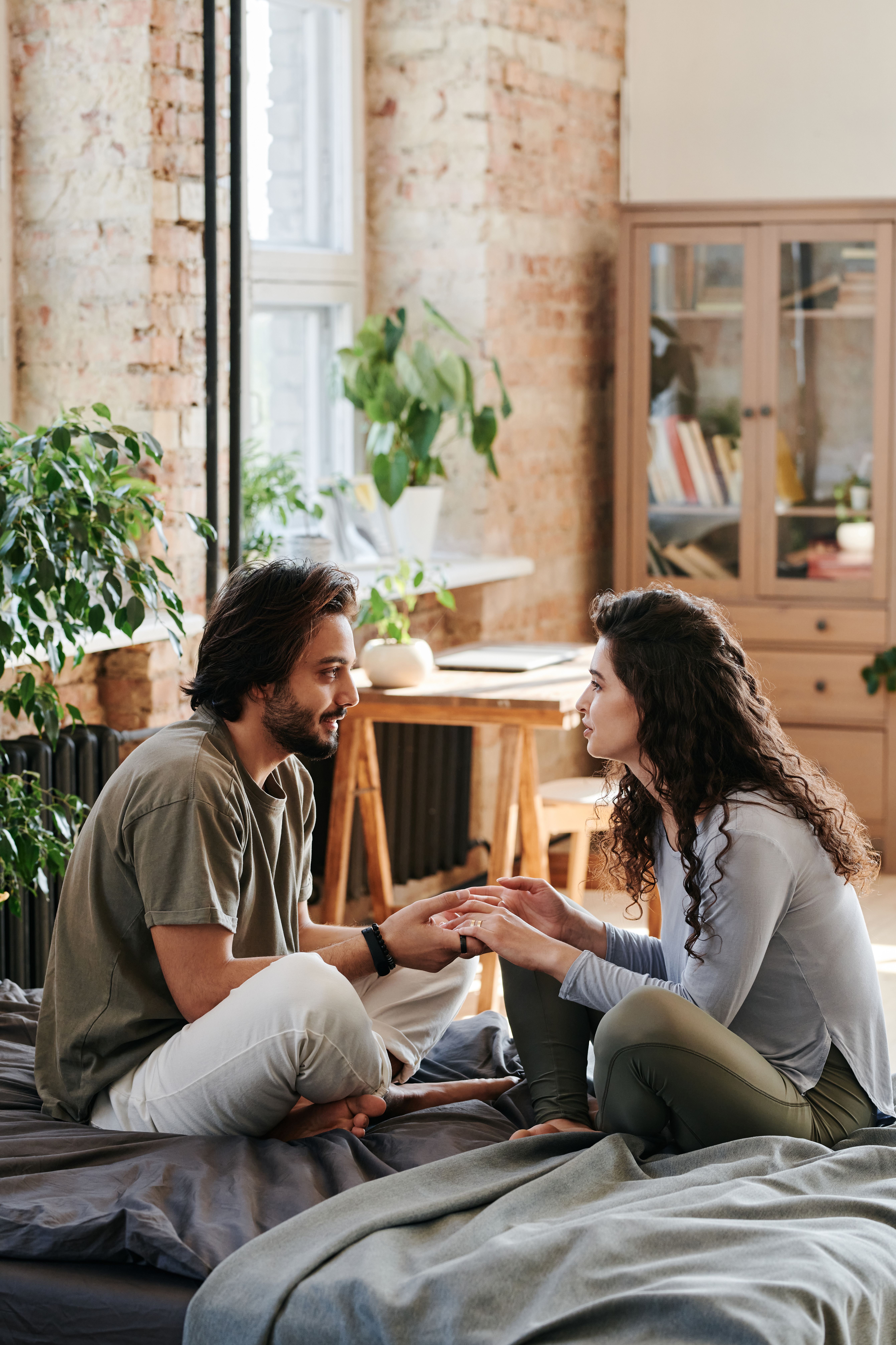 husband and wife talking, sharing thoughts with each other