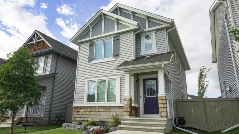 mid-size home with a small yard