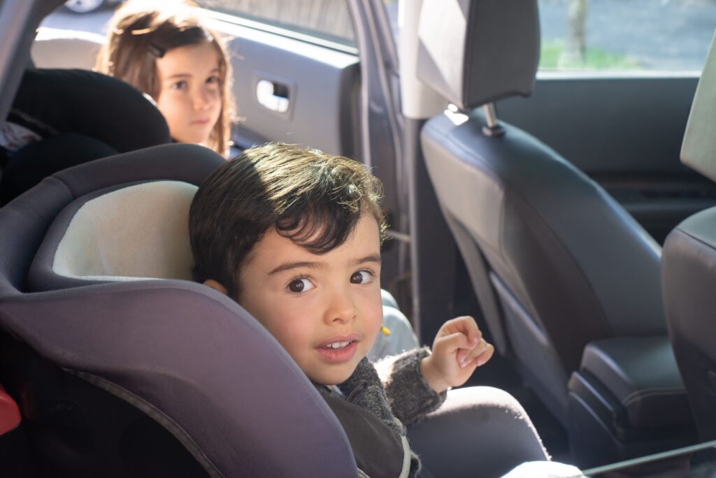 child safely buckled in carseat