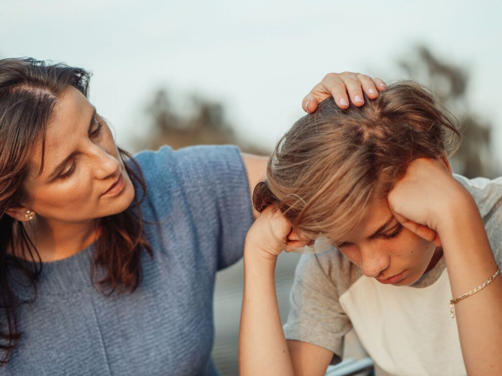 mother listening to disappointed child
