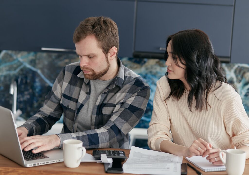 husband and wife planning a budget