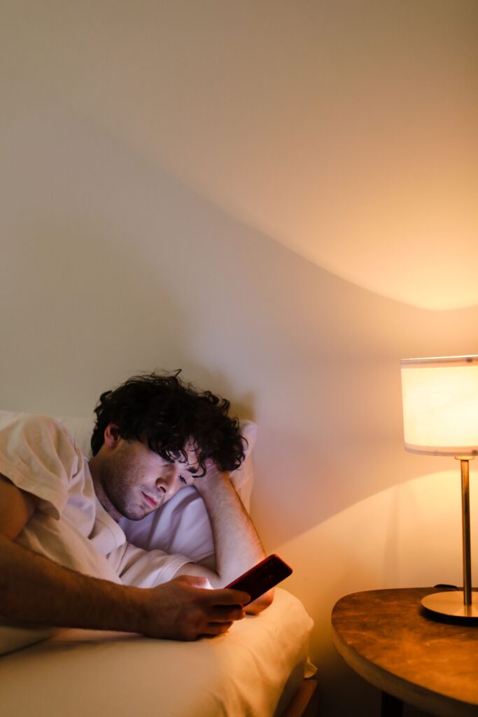 person on cell phone late at night