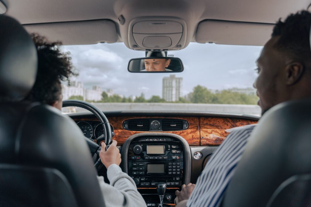 Father and son bonding while driving