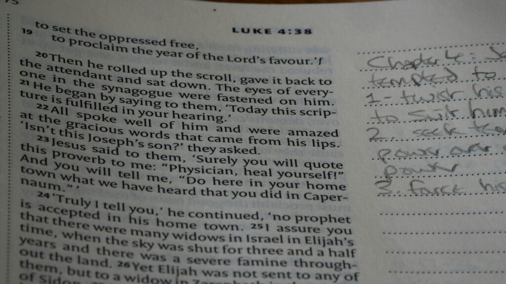 An open book with writing on it