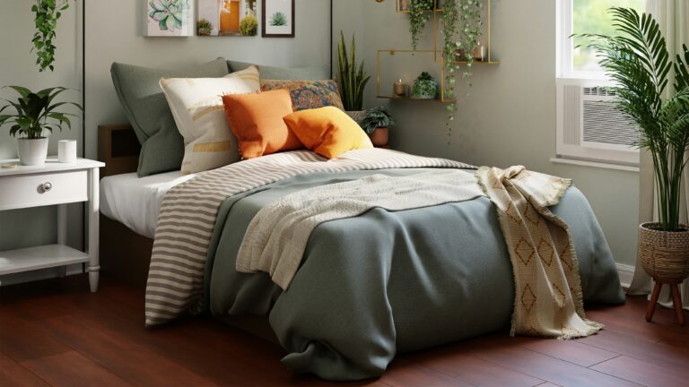 white bed with gray and white bed linen