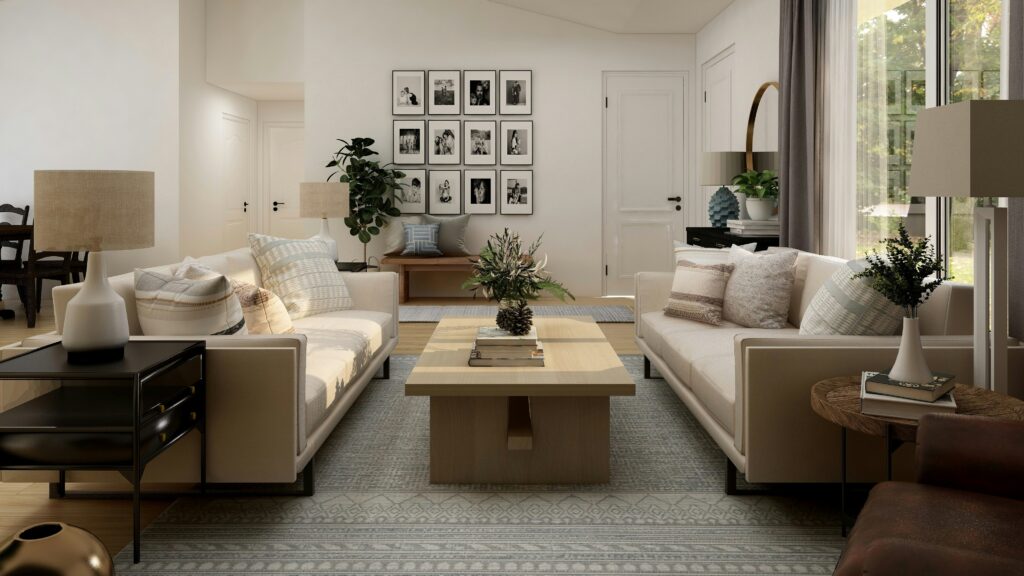 living room with white sofa set and green potted plant