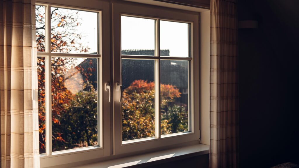 white wooden framed glass window