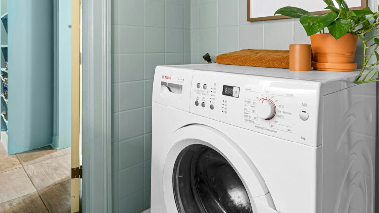 A laundry room with a washer and dryer
