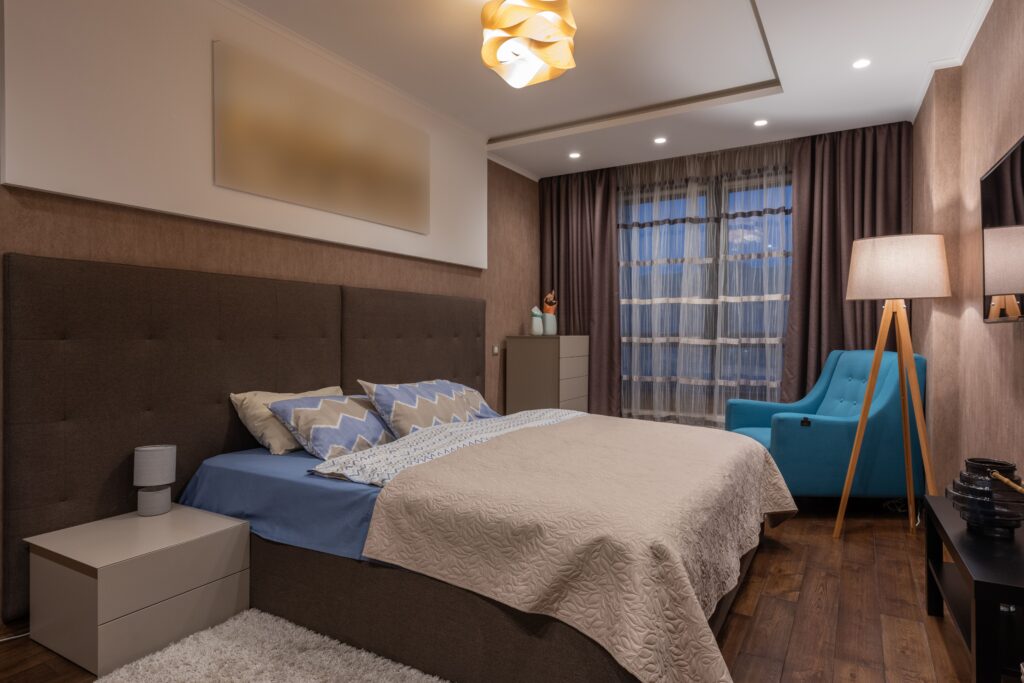 bedroom at night with bright overhead light
