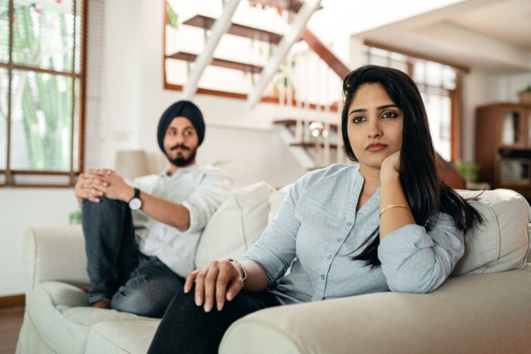 couple sitting on couch having a quiet time
