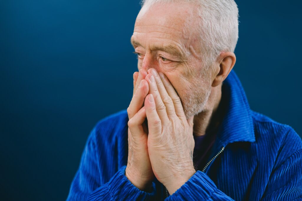 older person with sinus congestion