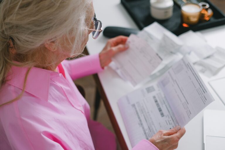 woman reviewing monthly bills