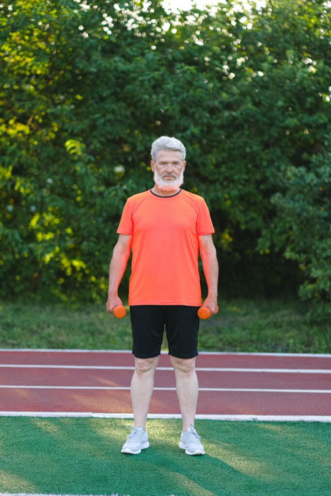 walking with dumb-bells in each hand