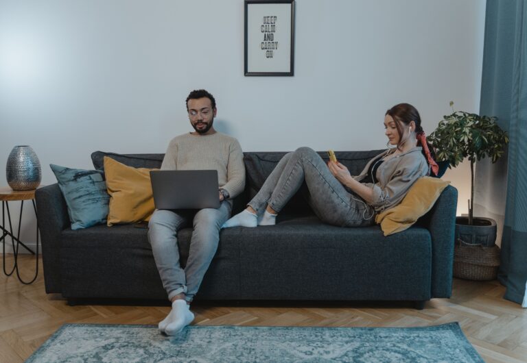 couple sitting on couch relaxing