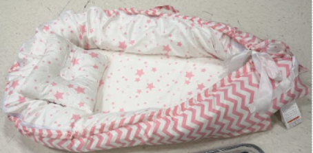 A Popular Baby Lounger Is Under a New Federal Safety Warning Over Fall and Entrapment Risks—What Parents and Grandparents Should Know Before Using One for an Infant